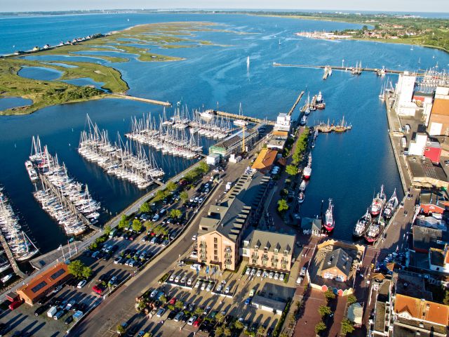 Heiligenhafen with Graswarder, marina, fishing harbour and harbour hotel Meereszeiten